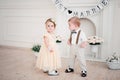 Two babies wedding - boy and girl dressed as bride and groom Royalty Free Stock Photo