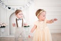 Two babies wedding - boy and girl dressed as bride and groom Royalty Free Stock Photo