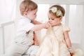 Two babies wedding - boy and girl dressed as bride and groom Royalty Free Stock Photo