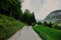 Two baby girls at path to caves at Mount Krippenstein in Hallstatt, Upper Austria, Europe