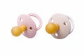 Two baby pacifiers with rubber