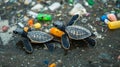 Two Baby Sea Turtles Navigating Plastic Waste on a Beach Royalty Free Stock Photo