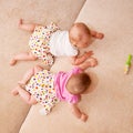 Two baby twins crawling togethe Royalty Free Stock Photo