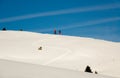 Two backcountry skiers enjoying the view and climbing a mountain Royalty Free Stock Photo