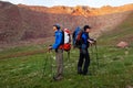 Two backpackers in mountains Royalty Free Stock Photo