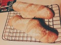 Two baguettes on a baking grid