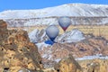 Two balloons on a background of mountains of Capadocia. Turkey.