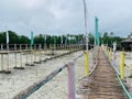 Two bamboo bridges over a sandy beach in Bantayan Island, Philippines Royalty Free Stock Photo