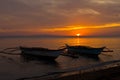Two Banca Boats at Sunset on Beach Royalty Free Stock Photo