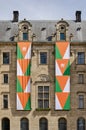 Two banners on the city hall