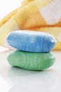 Two bar of soaps and towel Royalty Free Stock Photo