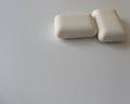 Two bars of soap on a white table. Nice white sticks. Royalty Free Stock Photo