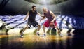 Two basketball players action in the gym Royalty Free Stock Photo