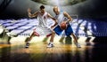 Two basketball players action in the gym Royalty Free Stock Photo