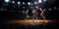 Two basketball players in action Royalty Free Stock Photo