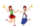 two bavarian women dancing with beers