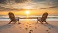 Two beach chairs at sunset overlooking ocean Royalty Free Stock Photo
