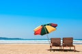 Two beach chairs and umbrella on tropical ocean beach Royalty Free Stock Photo