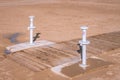 Two beach showers for feet cleaning from beach sand Royalty Free Stock Photo