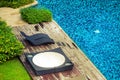 beach sunbeds near swimming pool Royalty Free Stock Photo