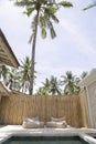 Two bean bags next to the pool