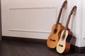 Two beautiful acoustic guitars on the floor Royalty Free Stock Photo