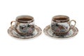 Two beautiful antique cups of coffee