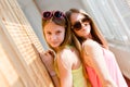 Two beautiful blond teenage girls having fun happy smiling Royalty Free Stock Photo