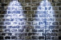 Two beautiful blue spotlights shining at an aged brick wall Royalty Free Stock Photo