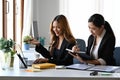 Two business colleagues working together in modern office. Royalty Free Stock Photo