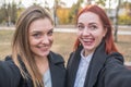 Two beautiful and cute girlfriends take a selfie.