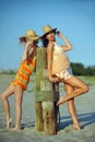 Two beautiful fashion models enjoy the beach Royalty Free Stock Photo
