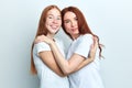 Two beautiful ginger women posing to the camera Royalty Free Stock Photo