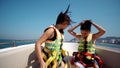 Two beautiful girls enjoying a trip on a boat Royalty Free Stock Photo