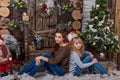 Two beautiful girls posing in Christmas decorations Royalty Free Stock Photo