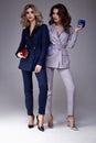 Two beautiful glamour woman friend colleague wear formal dr Royalty Free Stock Photo