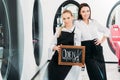 two beautiful hairdressers standing