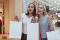 Young women enjoying shopping together at the mall Royalty Free Stock Photo