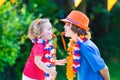 Two beautiful kids Dutch football supporters Royalty Free Stock Photo
