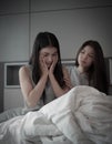 Two beautiful ladies talking together with unhappy feeling Royalty Free Stock Photo