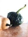 two beautiful pumpkins with white background. seasonal vegetables