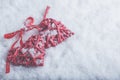 Two beautiful romantic vintage red hearts tied together with ribbon on white snow background. Love and St. Valentines Day concept Royalty Free Stock Photo