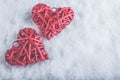 Two beautiful romantic vintage red hearts together on a white snow background. Love and St. Valentines Day concept. Royalty Free Stock Photo