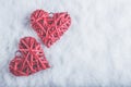 Two beautiful romantic vintage red hearts together on a white snow background. Love and St. Valentines Day concept. Royalty Free Stock Photo