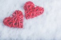 Two beautiful romantic vintage red hearts together on a white snow background. Love and St. Valentines Day concept. Royalty Free Stock Photo