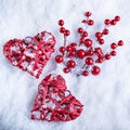 Two beautiful romantic vintage red hearts together on a white snow winter background. Love and St. Valentines Day concept Royalty Free Stock Photo