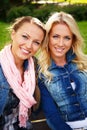 Two beautiful smiling young women Royalty Free Stock Photo