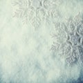 Two beautiful sparkling vintage snowflakes on a white frost snow background. Winter and Christmas concept Royalty Free Stock Photo