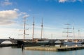Two beautiful tall ships in a harbour