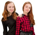 Two beautiful teen girls in red and black clothes Royalty Free Stock Photo